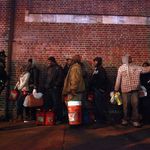 Crowds wait for free gas November 3, 2012 at the Bedford Avenue Armory